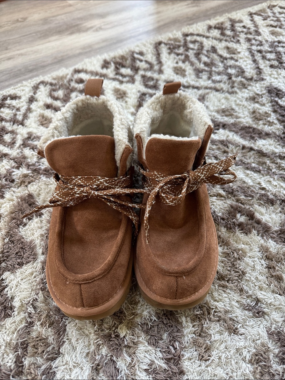 Brown leather and Sherpa boots